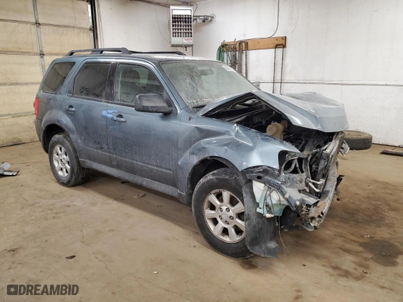 2010 Mazda Tribute Touring with VIN 4F2CY9C72AKM02952, listed as a Copart auction lot 84197854 with 0 mi miles and Salvage Title. Bid and sale history available at carsss.com. Image 4.