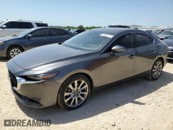 2021 Mazda 3 Premium with VIN JM1BPADL9M1319945, listed as a Copart auction lot 52902425 with 74,221 mi miles and Salvage title. Bid and sale history available at DreamBid. Image 1.