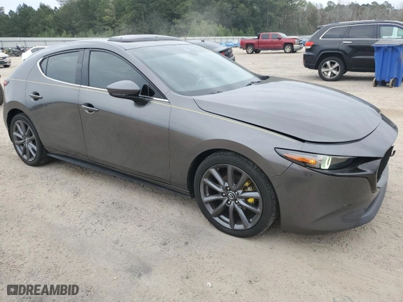 2019 Mazda Mazda3 Hatchback w/Premium Pkg with VIN JM1BPANM3K1140563, listed as a Copart auction lot 70853064 with 28,348 mi miles and Salvage Title. Bid and sale history available at carsss.com. Image 4.
