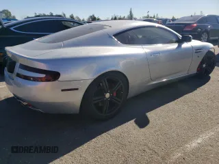 2007 Aston Martin DB9 z VIN SCFAB01A37GA08055, wystawiony jako Copart lot #82733743 z przebiegiem 39 201 mil mil oraz . Historia ofert i sprzedaży dostępna na DreamBid. Obrazek 3.