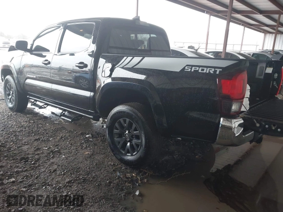 2023 Toyota Tacoma 4WD SR with VIN 3TMCZ5AN8PM538298, listed as a IAAI auction lot 41472145 with 66,484 mi miles. Bid and sale history available at carsss.com. Image 3.
