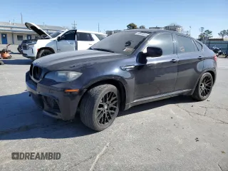 2011 BMW X6 M with VIN 5YMGZ0C55BLK13658, listed as a Copart auction lot 49910015 with 140,473 mi miles and Clean Title. Bid and sale history available at carsss.com. Image 1.