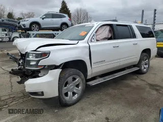 2017 Chevrolet Suburban Premier with VIN 1GNSKJKC6HR305372, listed as a Copart auction lot 47477705 with 141,324 mi miles and Salvage Title. Bid and sale history available at DreamBid. Image 1.