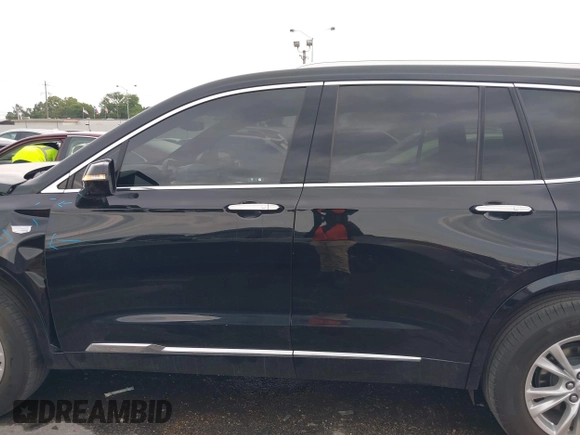 2023 Cadillac XT6 FWD Luxury z VIN 1GYKPAR43PZ147512, wystawiony jako IAAI lot #42175720 z przebiegiem 31 520 mil mil oraz . Historia ofert i sprzedaży dostępna na DreamBid. Obrazek 15.