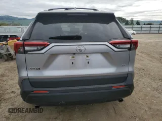 2019 Toyota RAV4 LE with VIN JTMH1RFV7KJ003899, listed as a Copart auction lot 52204315 with 27,491 mi miles and Salvage Title. Bid and sale history available at carsss.com. Image 6.