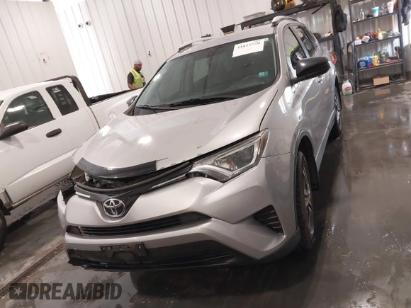 2016 Toyota RAV4 LE with VIN 2T3BFREV7GW450556, listed as a IAAI auction lot 41815720 with 106,734 mi miles. Bid and sale history available at carsss.com. Image 13.
