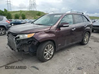 2012 Kia Sorento SX with VIN 5XYKWDA29CG218984, listed as a Copart auction lot 61505105 with 100,939 mi miles and Salvage title. Bid and sale history available at DreamBid. Image 1.