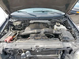 2012 Ford F-150 XL with VIN 1FTFW1ETXCFB32623, listed as a Copart auction lot 54597435 with 210,722 mi miles and Salvage Title. Bid and sale history available at DreamBid. Image 11.