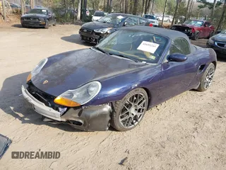 2001 Porsche Boxster with VIN WP0CA29841U626899, listed as a IAAI auction lot 41695245 with 138,097 mi miles. Bid and sale history available at carsss.com. Image 2.