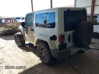 2015 Jeep Wrangler Altitude z VIN 1C4GJWBG2FL714146, wystawiony jako IAAI lot #41417659 z przebiegiem Nie podano mil oraz . Historia ofert i sprzedaży dostępna na DreamBid. Obrazek 3.