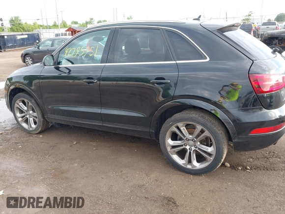 2015 Audi Q3 Premium Plus z VIN WA1EFCFS6FR001473, wystawiony jako IAAI lot #42795951 z przebiegiem 148 638 mil mil oraz . Historia ofert i sprzedaży dostępna na DreamBid. Obrazek 14.