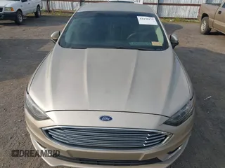 2018 Ford Fusion SE z VIN 3FA6P0HD6JR279927, wystawiony jako IAAI lot #42430172 z przebiegiem 145 080 mil mil oraz . Historia ofert i sprzedaży dostępna na DreamBid. Obrazek 6.