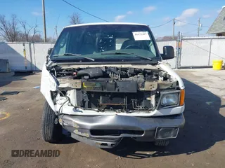 2006 Ford Econoline Cargo with VIN 1FTRE14W76HA23251, listed as a IAAI auction lot 41675487 with 98,597 mi miles. Bid and sale history available at carsss.com. Image 13.