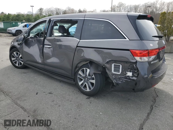 2015 Honda Odyssey Touring Elite with VIN 5FNRL5H95FB117971, listed as a Copart auction lot 52083475 with 82,626 mi miles and Salvage Title. Bid and sale history available at DreamBid. Image 2.