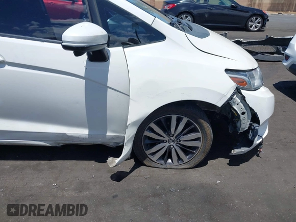 2015 Honda Fit EX-L with VIN 3HGGK5H89FM740430, listed as a IAAI auction lot 42255324 with 116,995 mi miles and . Bid and sale history available at DreamBid. Image 12.
