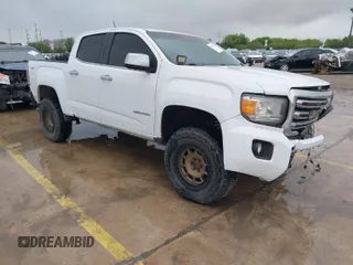 2018 GMC Canyon 4WD SLT with VIN 1GTP6DE18J1111056, listed as a IAAI auction lot 41903405 with 99,280 mi miles. Bid and sale history available at carsss.com. Image 1.