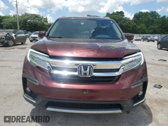 2019 Honda Pilot Touring 7-Passenger with VIN 5FNYF6H6XKB094020, listed as a Copart auction lot 61460255 with 135,149 mi miles and Salvage title. Bid and sale history available at DreamBid. Image 5.
