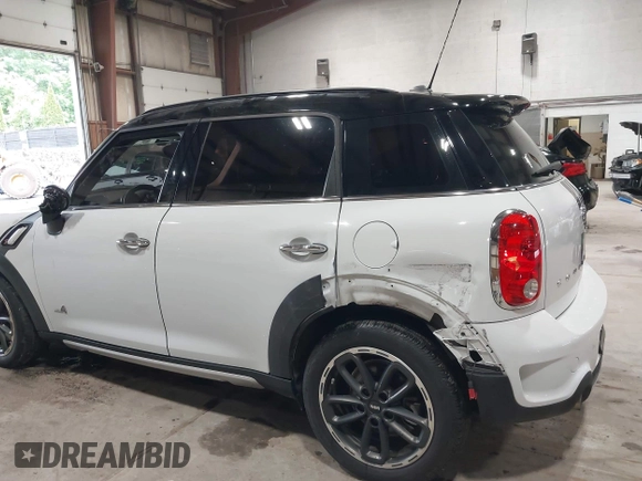 2016 MINI Countryman S with VIN WMWZC5C57GWU20085, listed as a IAAI auction lot 42403406 with 90,592 mi miles and . Bid and sale history available at DreamBid. Image 6.