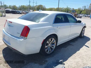 2016 Chrysler 300 Anniversary Edition with VIN 2C3CCAAG7GH313739, listed as a IAAI auction lot 41833824 with 285,806 mi miles and . Bid and sale history available at DreamBid. Image 4.