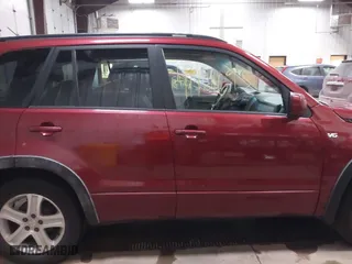 2006 Suzuki Grand Vitara Luxury with VIN JS3TD947264106126, listed as a IAAI auction lot 41961693 with 146,105 mi miles. Bid and sale history available at carsss.com. Image 13.