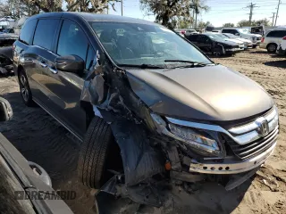 2020 Honda Odyssey Touring with VIN 5FNRL6H84LB012640, listed as a Copart auction lot 80430814 with 58,313 mi miles and Salvage Title. Bid and sale history available at DreamBid. Image 4.