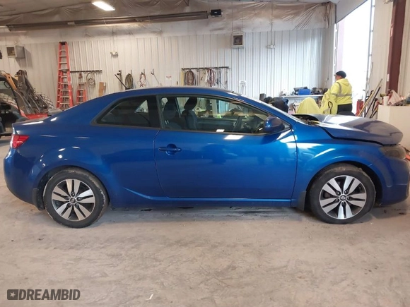 2013 Kia Forte Koup EX with VIN KNAFU6A29D5656754, listed as a IAAI auction lot 41067933 with NaN miles. Bid and sale history available at carsss.com. Image 13.
