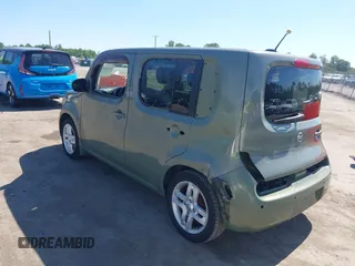 2009 Nissan Cube SL z VIN JN8AZ28R79T103005, wystawiony jako IAAI lot #42289199 z przebiegiem 135 952 mil mil oraz . Historia ofert i sprzedaży dostępna na DreamBid. Obrazek 3.