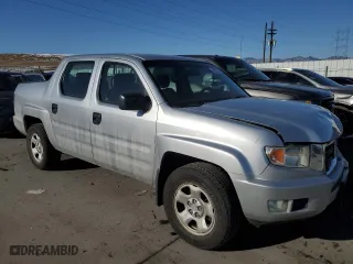2010 Honda Ridgeline RT with VIN 5FPYK1F28AB008613, listed as a Copart auction lot 43267065 with 145,405 mi miles and Salvage Title. Bid and sale history available at carsss.com. Image 4.