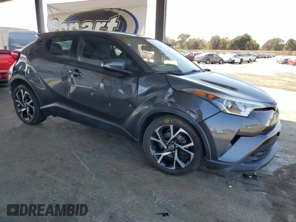 2018 Toyota C-HR XLE with VIN NMTKHMBXXJR025925, listed as a Copart auction lot 60121105 with 107,081 mi miles and Salvage title. Bid and sale history available at DreamBid. Image 4.