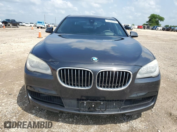 2015 BMW 7 Series 750Li z VIN WBAYE8C51FD782155, wystawiony jako Copart lot #54796505 z przebiegiem 112 772 mil mil oraz Szkoda całkowita • Salvage title. Historia ofert i sprzedaży dostępna na DreamBid. Obrazek 5.