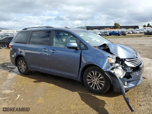 2015 Toyota Sienna XLE with VIN 5TDYK3DC2FS657231, listed as a Copart auction lot 48948315 with 137,082 mi miles and Salvage Title. Bid and sale history available at carsss.com. Image 4.