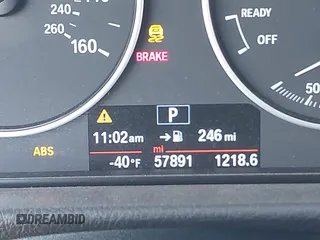 2015 BMW 3 Series 320i with VIN WBA3B1C53FK138310, listed as a IAAI auction lot 41677208 with 57,891 mi miles. Bid and sale history available at carsss.com. Image 15.