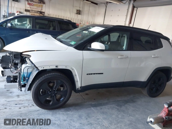 2018 Jeep Compass Altitude with VIN 3C4NJDBB4JT395992, listed as a IAAI auction lot 41318649 with 88,887 mi miles and . Bid and sale history available at carsss.com. Image 14.