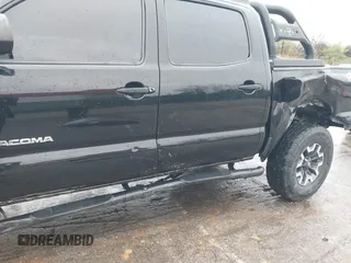 2015 Toyota Tacoma with VIN 3TMLU4ENXFM185371, listed as a IAAI auction lot 41952513 with 87,128 mi miles and . Bid and sale history available at DreamBid. Image 18.