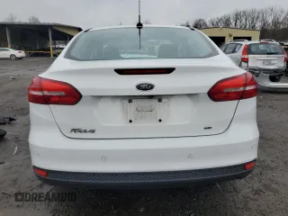 2016 Ford Focus SE z VIN 1FADP3F2XGL223796, wystawiony jako Copart lot #52567505 z przebiegiem Nie podano mil oraz Szkoda całkowita • Salvage title. Historia ofert i sprzedaży dostępna na DreamBid. Obrazek 6.