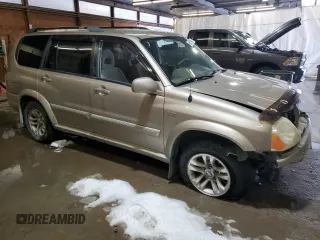 2005 Suzuki XL-7 LX with VIN JS3TX92V054105984, listed as a Copart auction lot 89070865 with 135,453 mi miles and Salvage Title. Bid and sale history available at carsss.com. Image 4.