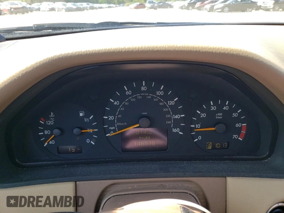 2000 Mercedes-Benz E-Class with VIN WDBJF65J2YB165568, listed as a Copart auction lot 70003994 with 146,518 mi miles and Salvage Title. Bid and sale history available at carsss.com. Image 9.