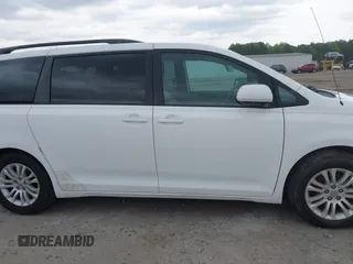 2011 Toyota Sienna XLE AAS with VIN 5TDYK3DC3BS161414, listed as a IAAI auction lot 41124705 with 167,364 mi miles. Bid and sale history available at carsss.com. Image 13.