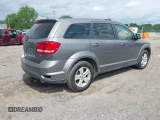 2012 Dodge Journey SXT with VIN 3C4PDCBB0CT358287, listed as a IAAI auction lot 42134914 with 140,553 mi miles and . Bid and sale history available at DreamBid. Image 4.