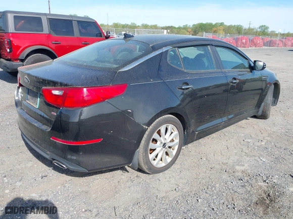 2015 Kia Optima LX with VIN KNAGM4A71F5630673, listed as a IAAI auction lot 42106584 with 245,005 mi miles. Bid and sale history available at carsss.com. Image 4.