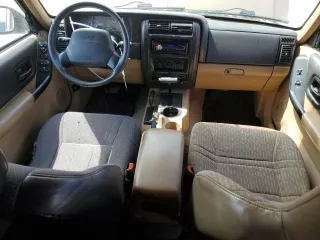 2000 Jeep Cherokee Classic с VIN 1J4FF58S7YL134763, выставлен на аукционе Copart как лот 55957205 с пробегом 229 160 миль миль и Списание • Salvage title. История ставок и продаж доступна на DreamBid. Изображение 8.