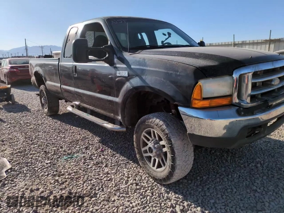 1999 Ford F-250 XL with VIN 1FTNX21FXXEC98957, listed as a Copart auction lot 61476665 with 414,070 mi miles and Salvage title. Bid and sale history available at DreamBid. Image 13.