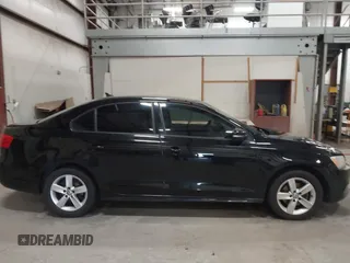 2014 Volkswagen Jetta SE with VIN 3VWD17AJ7EM409189, listed as a IAAI auction lot 42313804 with 139,950 mi miles and . Bid and sale history available at DreamBid. Image 13.