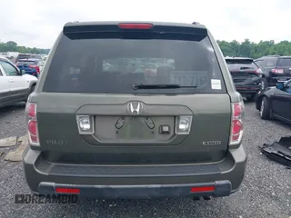 2006 Honda Pilot EX-L with VIN 5FNYF18776B011211, listed as a IAAI auction lot 39555749 with 295,998 mi miles and . Bid and sale history available at DreamBid. Image 17.