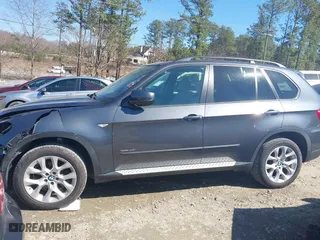 2011 BMW X5 35i with VIN 5UXZV4C51BL740731, listed as a IAAI auction lot 41771257 with 148,638 mi miles. Bid and sale history available at carsss.com. Image 14.