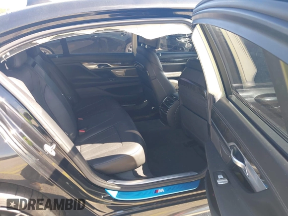 2016 BMW 7 Series 740i с VIN WBA7E2C51GG738889, выставлен на аукционе IAAI как лот 41838071 с пробегом 49 649 миль миль и . История ставок и продаж доступна на DreamBid. Изображение 8.