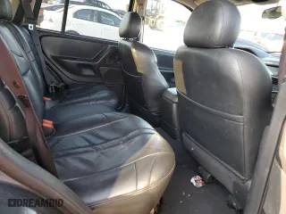 2002 Jeep Grand Cherokee Laredo with VIN 1J4GW48N32C180185, listed as a Copart auction lot 51988335 with 212,399 mi miles and Salvage Title. Bid and sale history available at carsss.com. Image 13.