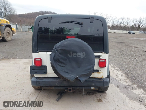 2005 Jeep Wrangler Sport with VIN 1J4FA49S25P352170, listed as a IAAI auction lot 41794958 with 154,304 mi miles. Bid and sale history available at carsss.com. Image 17.