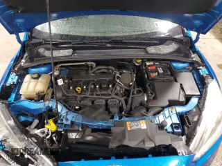 2016 Ford Focus SE z VIN 1FADP3F25GL208056, wystawiony jako Copart lot #57846215 z przebiegiem 127 239 mil mil oraz Szkoda całkowita • Salvage title. Historia ofert i sprzedaży dostępna na DreamBid. Obrazek 11.