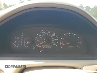 2002 Toyota Solara SE z VIN 2T1CE22P42C005554, wystawiony jako Copart lot #57756005 z przebiegiem 317 340 mil mil oraz Szkoda całkowita • Salvage title. Historia ofert i sprzedaży dostępna na DreamBid. Obrazek 9.